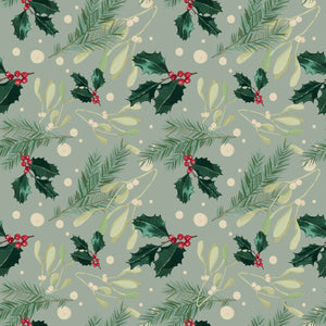 Pine tree branches and red berries in a green background