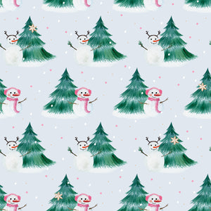 Snowmen besides pine trees with snow falling