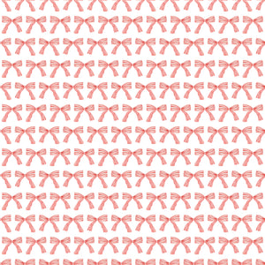 White Christmas wrapping paper with red bows