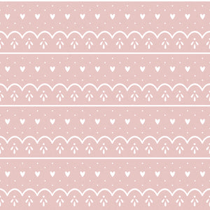 Pink wrapping paper with hearts, dots and scallops
