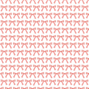 White Christmas wrapping paper with red bows